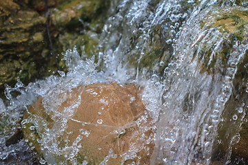 Image showing Small waterfall in a garden