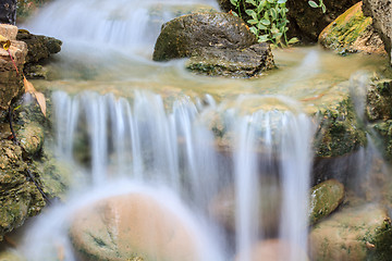 Image showing Small waterfall in a garden