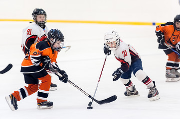 Image showing Game between children ice-hockey teams