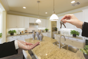 Image showing Handing Over New House Keys Inside Beautiful Kitchen