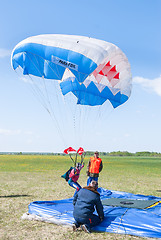 Image showing Parachutist woman missed by landing point