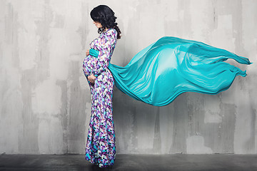 Image showing Pregnant woman over gray background