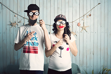 Image showing Funny couple waiting for children