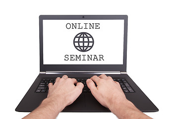 Image showing Man working on laptop, online seminar