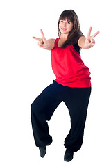 Image showing Young attractive woman with victory gesture