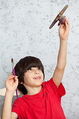 Image showing boy and plane