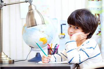 Image showing schoolchild doing homework