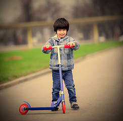 Image showing boy with scooter