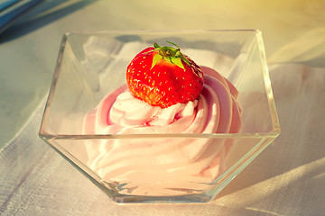 Image showing Dessert: cream soufflé and strawberries.