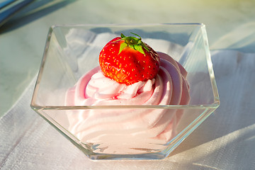 Image showing Dessert: cream soufflé and strawberries.