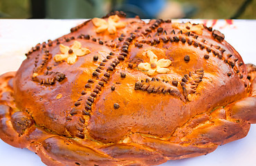 Image showing Beautiful cake on a white towel. Sold at the fair.