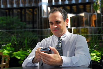 Image showing Businessman pda