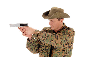 Image showing Soldier pointing a pistol.