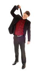 Image showing Man pulling his tie.