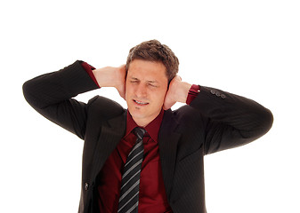 Image showing Man covering his ear's.