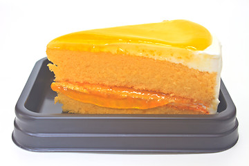 Image showing  Orange Cheesecake in plate on background