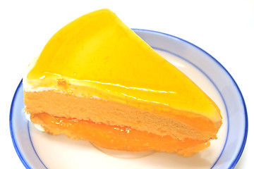 Image showing  Orange Cheesecake in plate on background