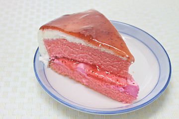 Image showing Strawberry cheesecake in plate on background