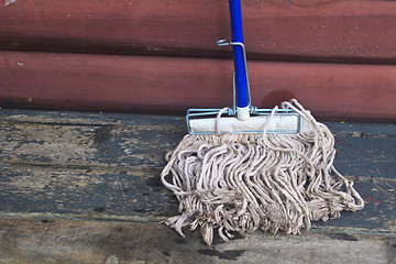 Image showing mop cleaning gadgets on terrace