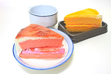 Image showing Dessert Orange Cheesecake with Strawberry cheesecake