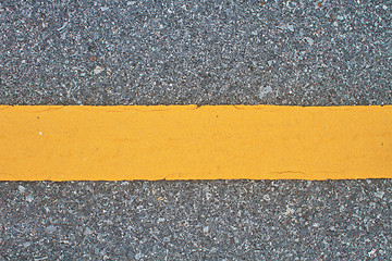 Image showing asphalt road with marking lines and tire tracks