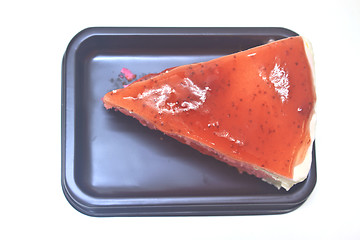 Image showing Strawberry cheesecake in plate on background