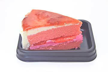Image showing Strawberry cheesecake in plate on background