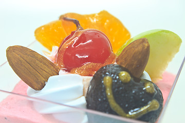 Image showing cupcake with cream and fruits