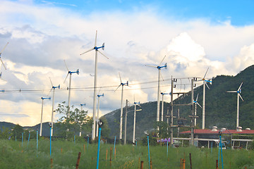 Image showing Wind turbines on a farm