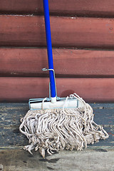 Image showing mop cleaning gadgets on terrace