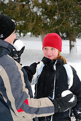 Image showing Family with snowballs