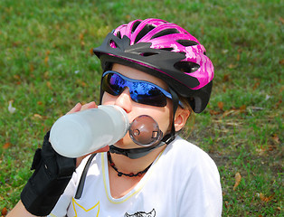 Image showing Girl drinking water