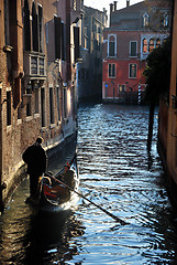 Image showing Gondolier in the channel in Venice