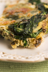 Image showing Omelet with vegetables and cheese. Frittata