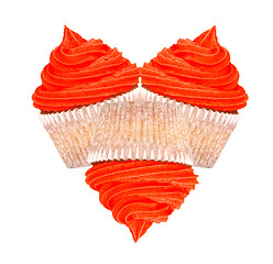 Image showing Three cupcakes with red icing in a heart shape