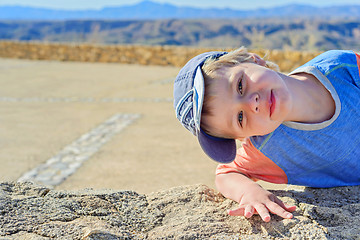 Image showing Little boy watching on you