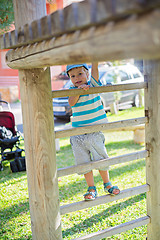 Image showing Boy playing on the stairs