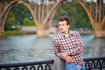 Image showing Handsome man outdoors over urban background