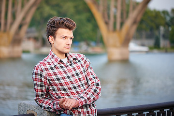 Image showing Handsome man outdoors over urban background