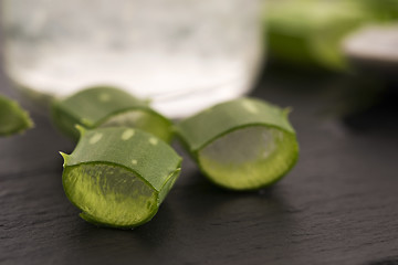 Image showing aloe vera juice with fresh leaves 