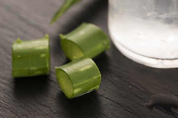 Image showing aloe vera juice with fresh leaves 