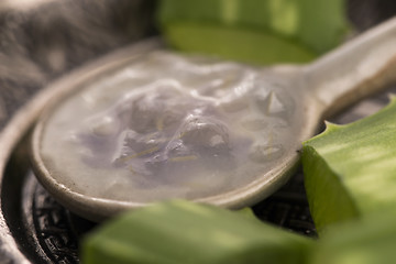 Image showing aloe vera juice with fresh leaves 