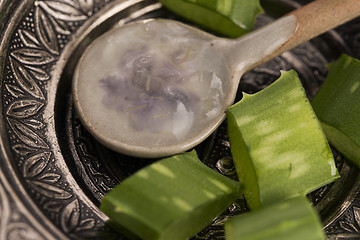 Image showing aloe vera juice with fresh leaves 