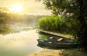 Image showing Boats near pier