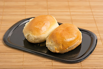 Image showing Homemade patties on black tray.