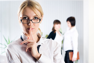 Image showing Attractive woman with sign 