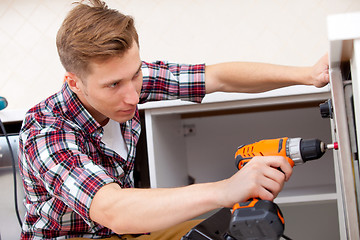 Image showing repairman screwdriver works