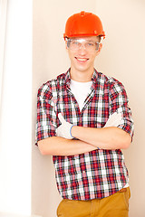 Image showing young smiling construction worker