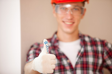 Image showing builder giving a thumbs up