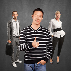 Image showing Teamwork and Asian Man In Striped Pullover